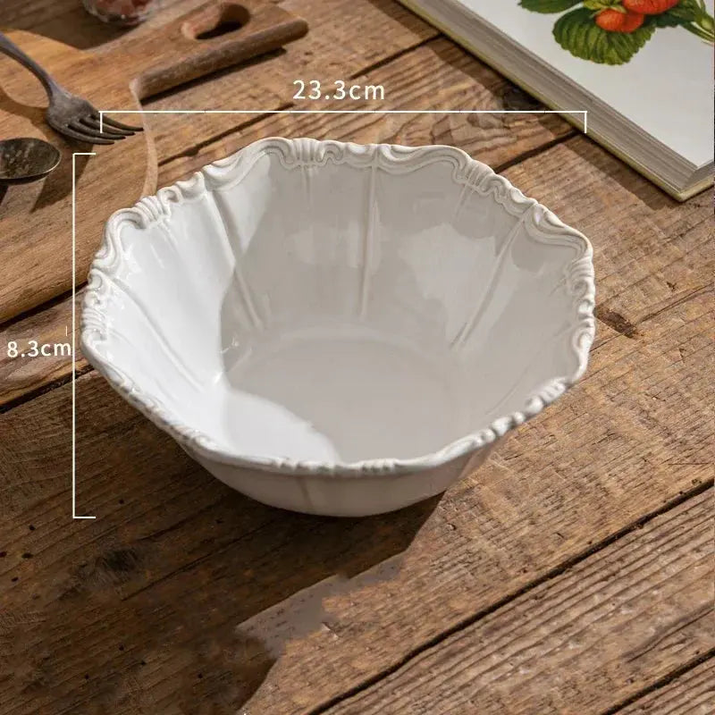 White ceramic bowl on a wooden surface with measurements