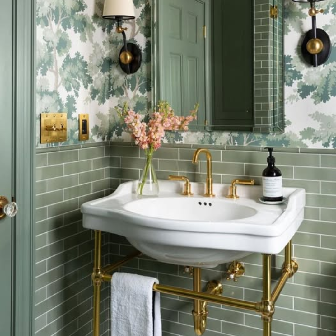 photograph of green vintage sink with gold bathroom design