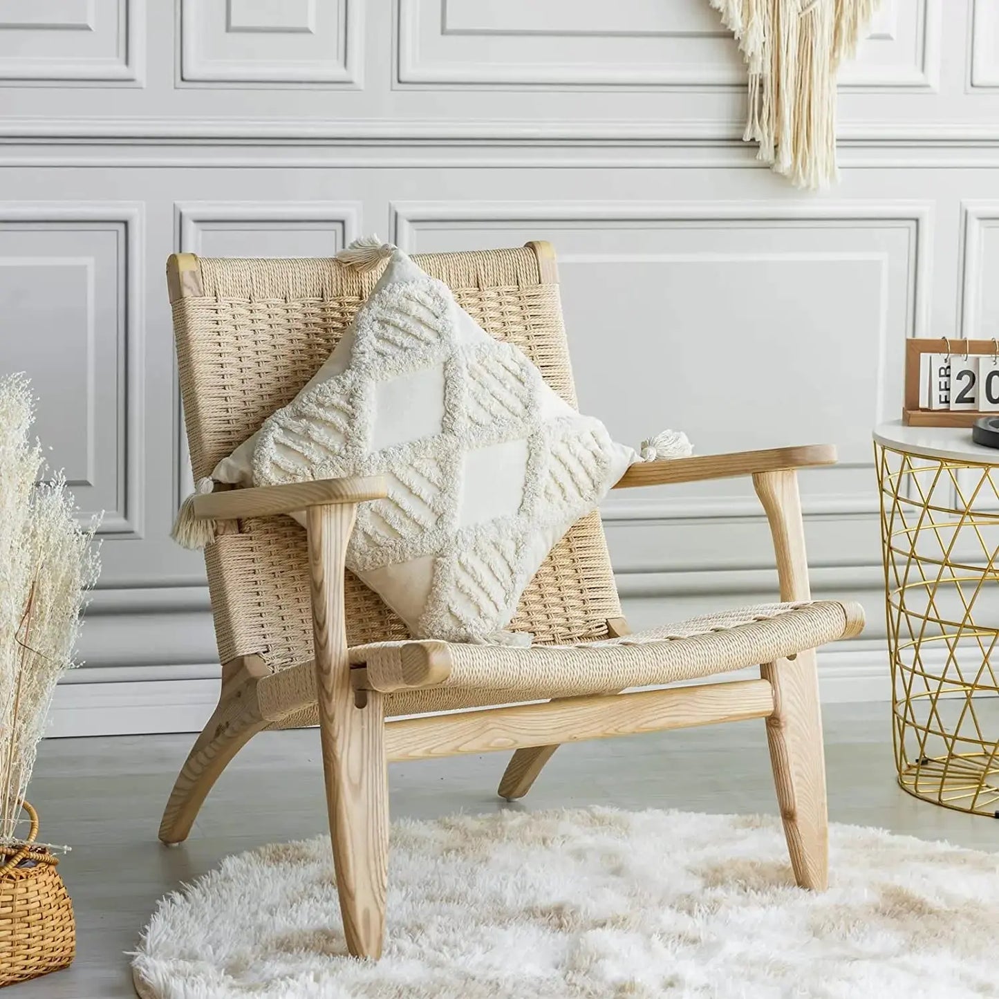 Wicker chair with a textured pillow in a room
