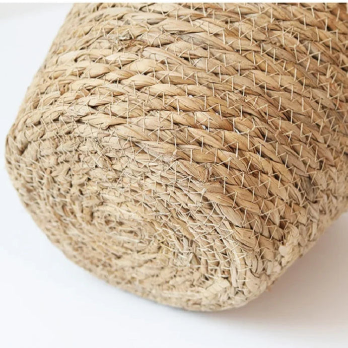 Close-up of a woven natural material product on a white background