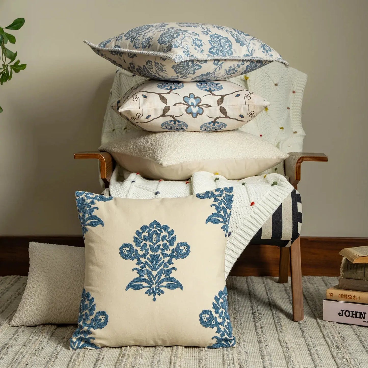 Decorative pillows with floral patterns on a chair