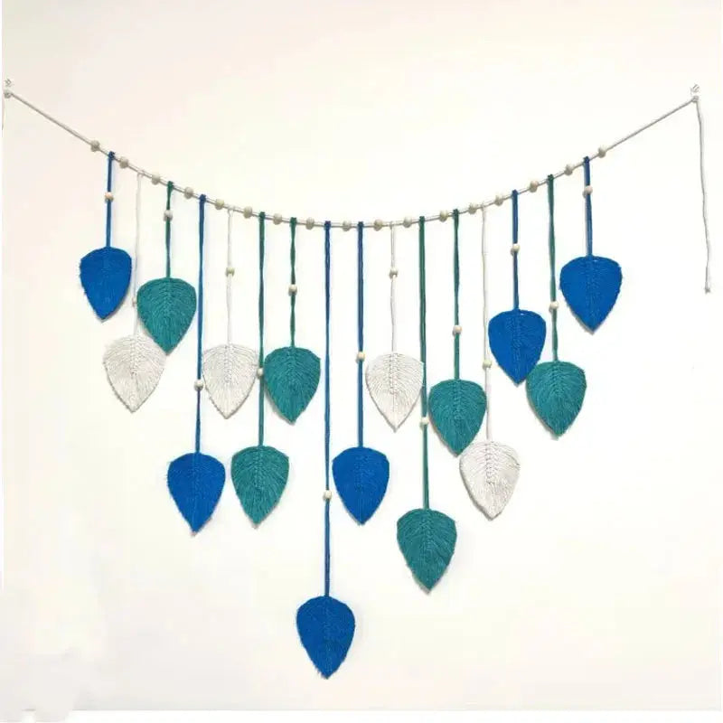 Decorative garland with blue, green, and white leaves