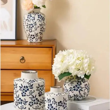 Decorative vases with floral arrangements on a table