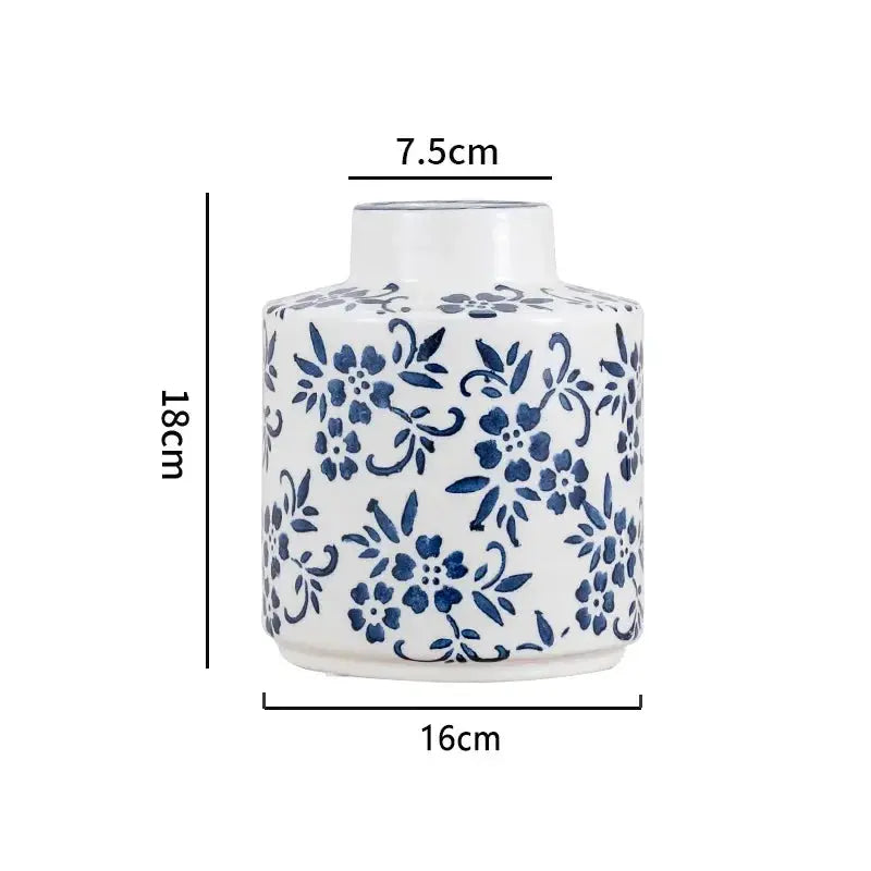 Ceramic vase with blue floral patterns and measurements