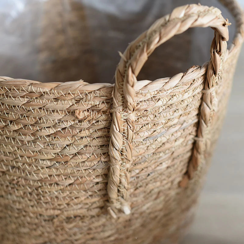 Close-up of a woven basket with a textured handle.