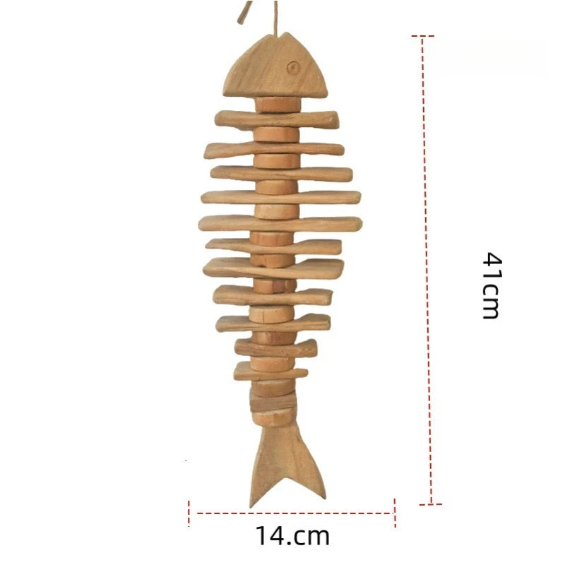 Wooden fish-shaped ornament with dimensions on a white background