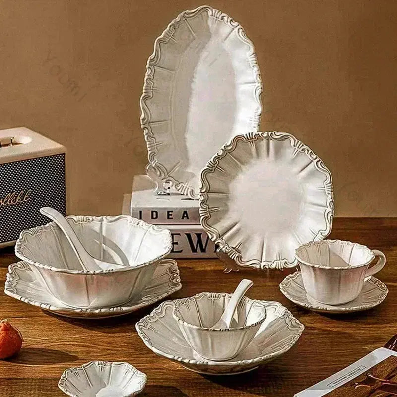 Set of decorative ceramic plates and bowls