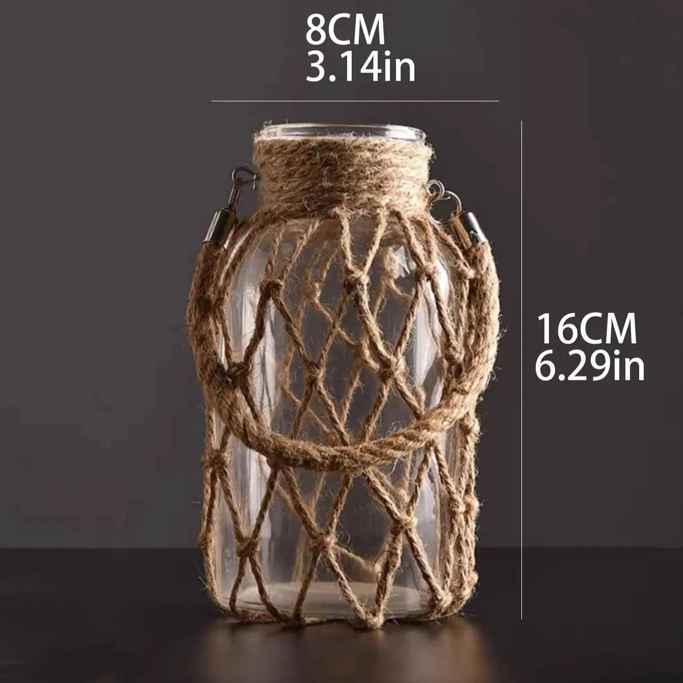 Glass jar with rope netting on a dark background