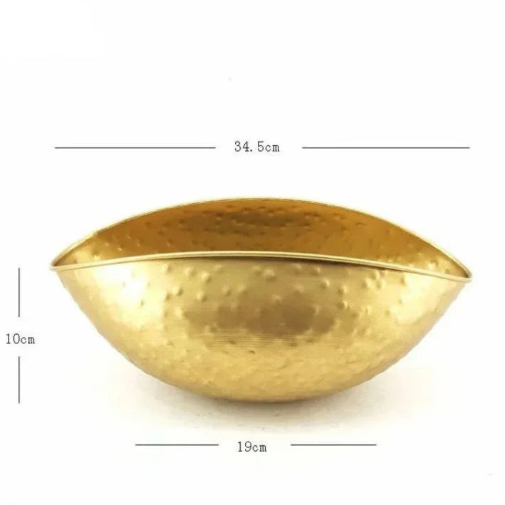 Gold decorative item with measurements on a white background