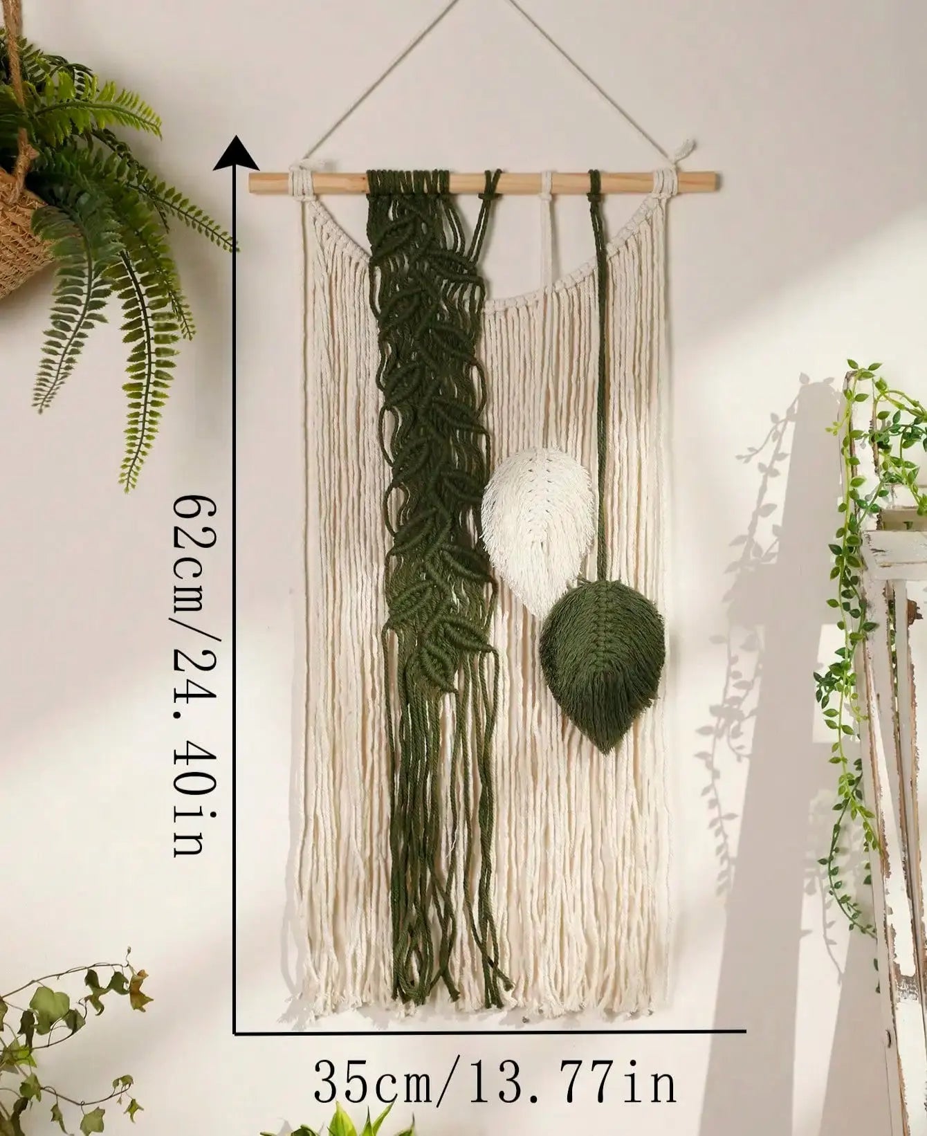 Macrame wall hanging with green and white elements