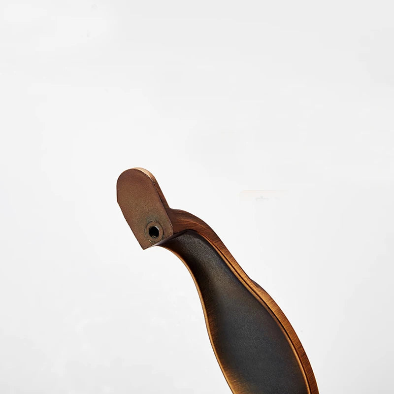 Wooden shoe last on a white background