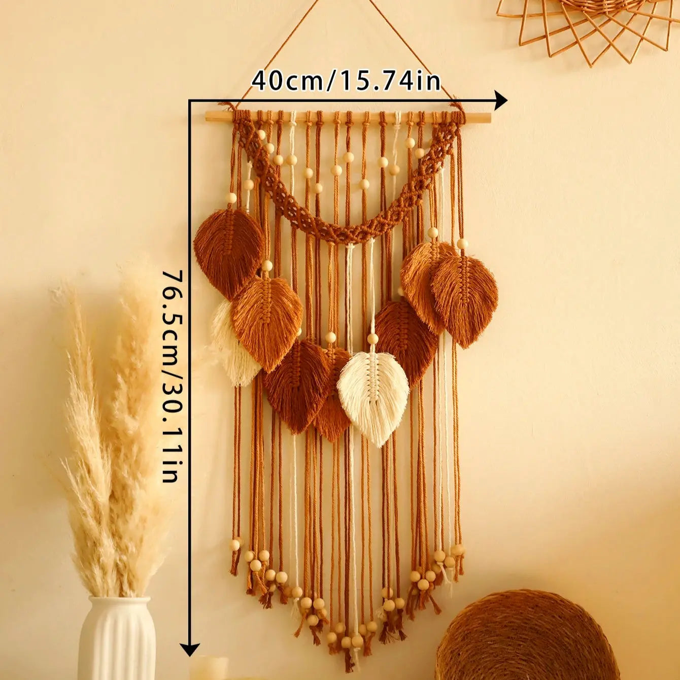 Decorative wall hanging with measurements on a beige wall.