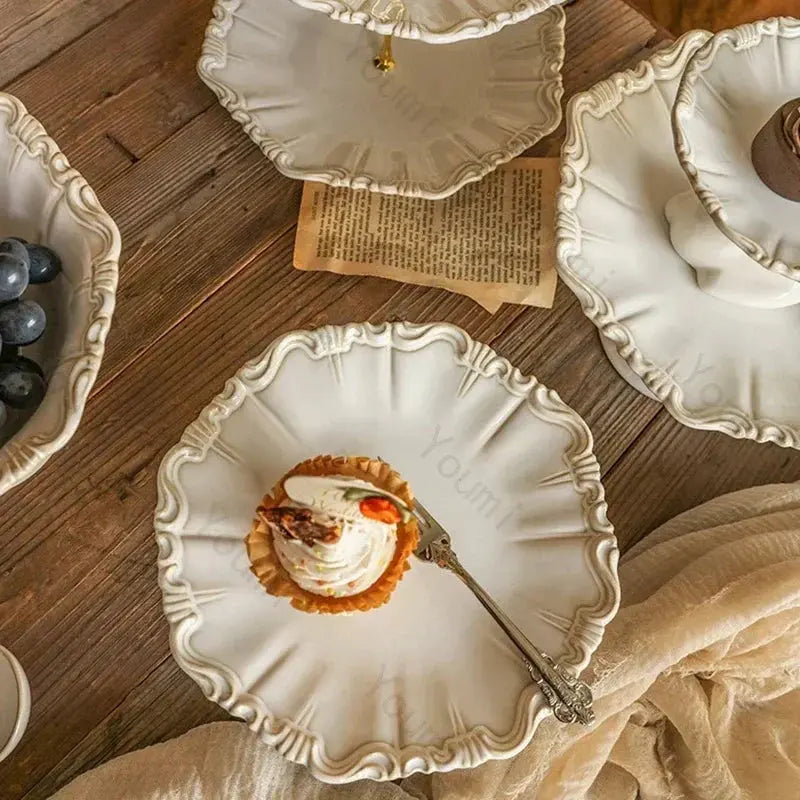 Decorative white plates with a small dessert