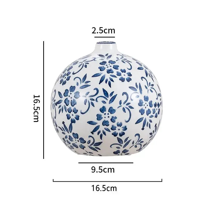 Ceramic vase with blue floral patterns and measurements