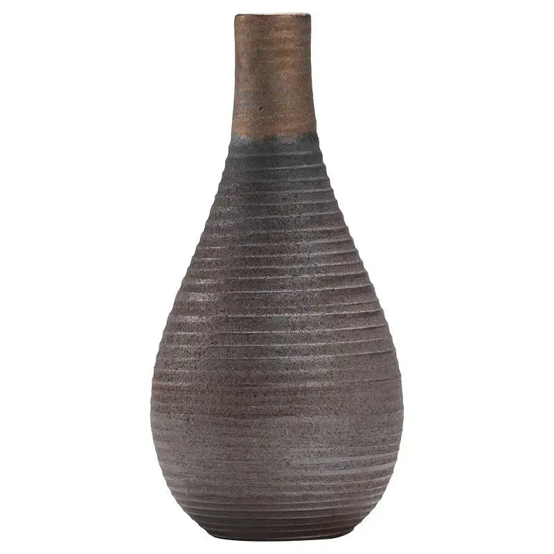 Textured brown vase on a white background