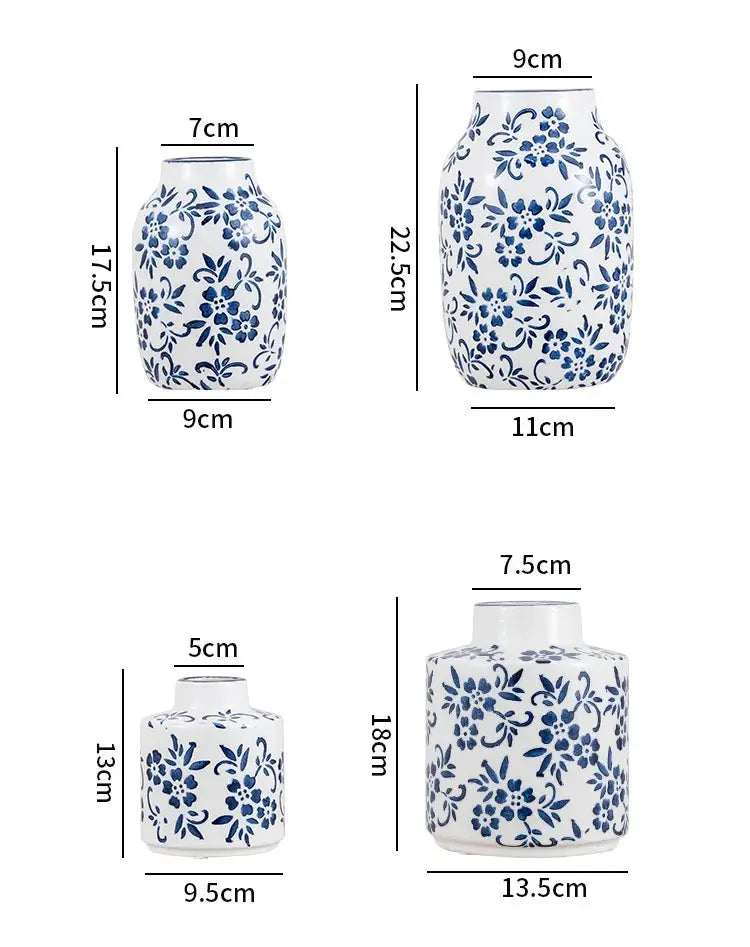 Set of four blue floral ceramic jars with measurements