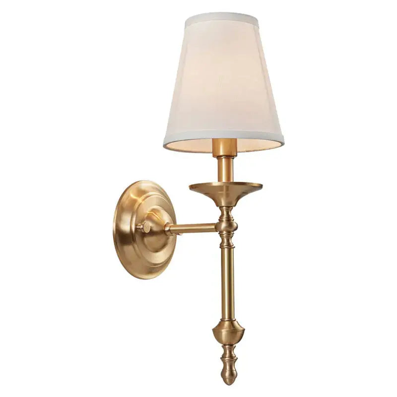 Brass wall sconce with a white lampshade