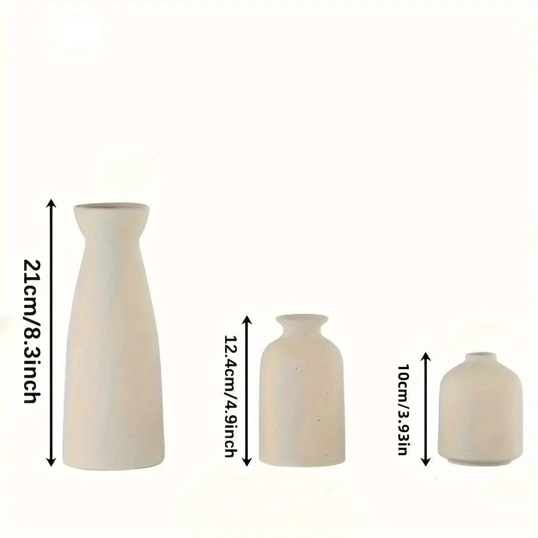 Three ceramic vases of different sizes with measurements