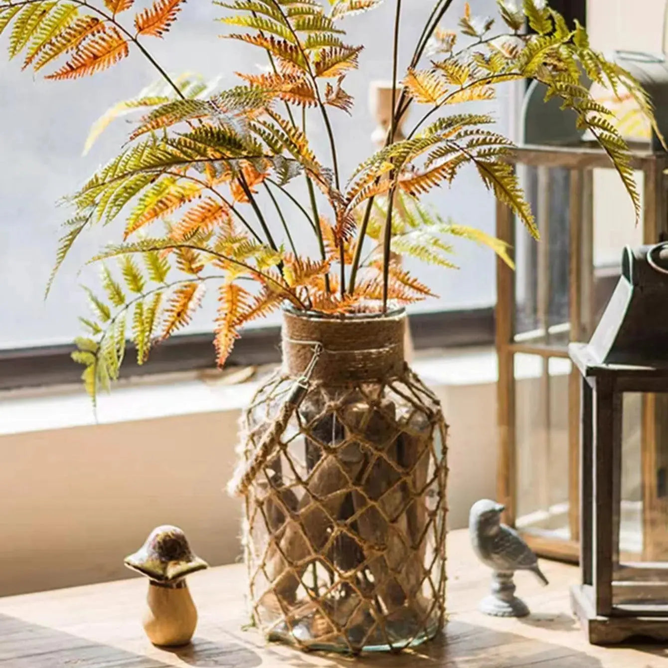 Decorative plant in a woven vase on a windowsill