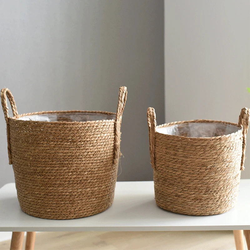 Two woven baskets on a white surface with a neutral background