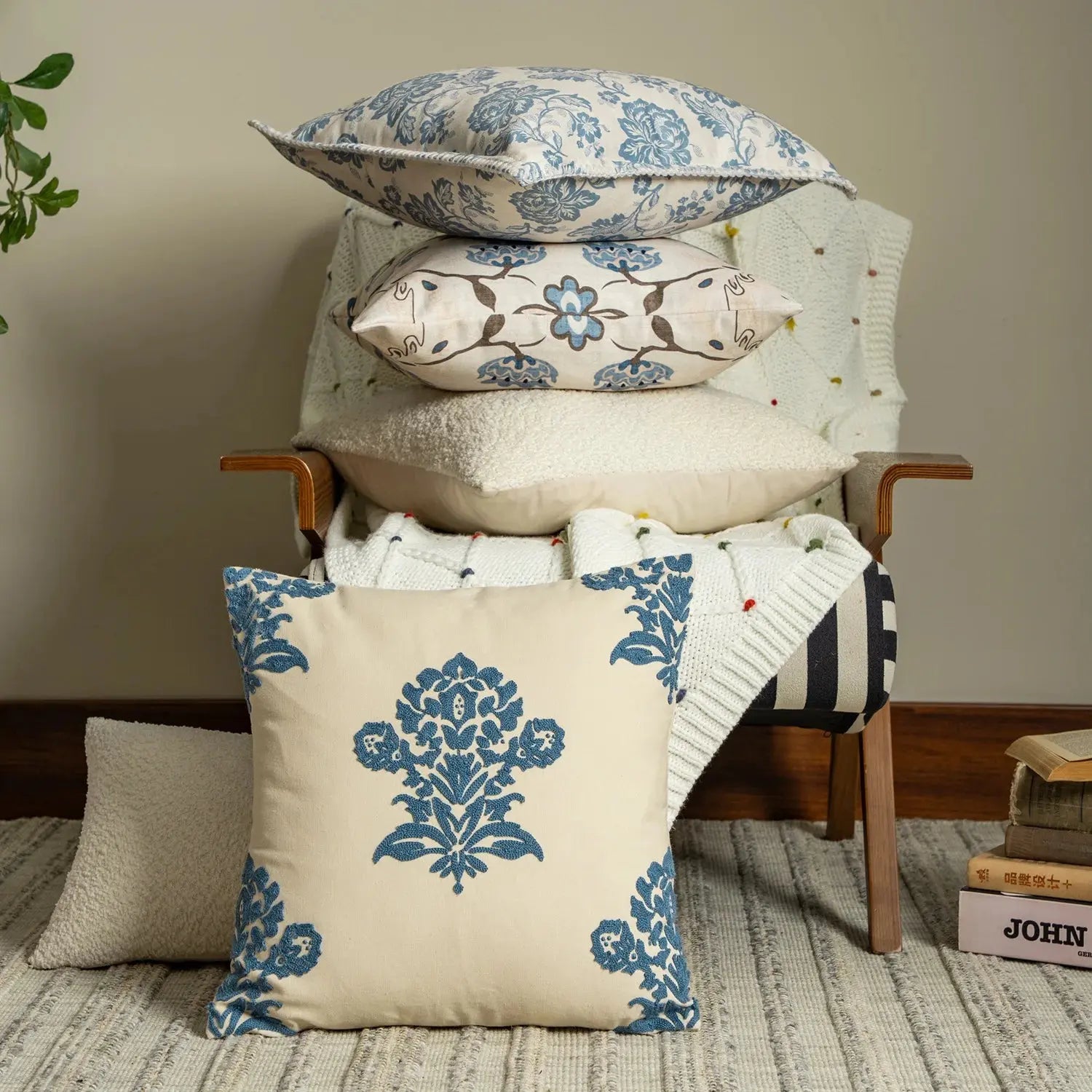 Decorative pillows with floral patterns on a chair 