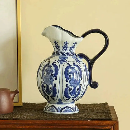 Ceramic pitcher with blue and white floral patterns