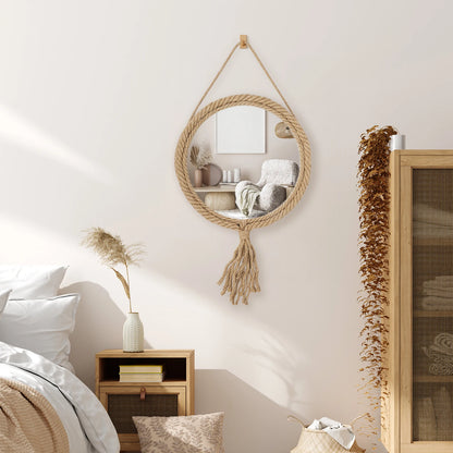 Hanging round mirror with tassels in a bedroom setting