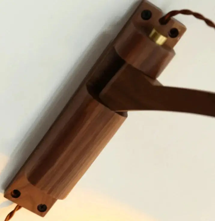 Wooden lamp with a warm glow on a white background