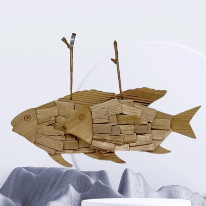 Wooden fish sculpture on a white background