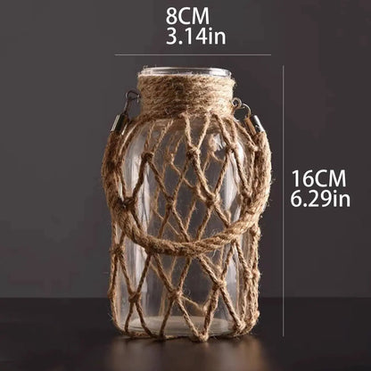 Glass jar with rope netting on a dark background