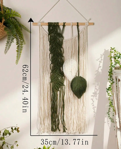 Macrame wall hanging with green and white elements