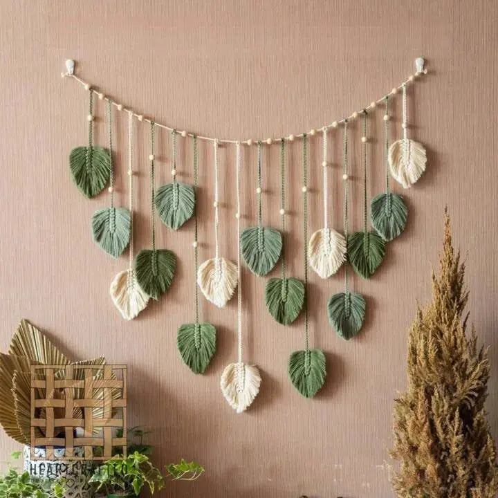 Decorative wall hanging with leaf-shaped ornaments