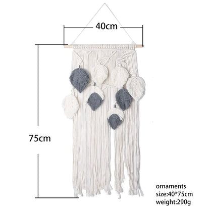 Macrame wall hanging with measurements on a white background