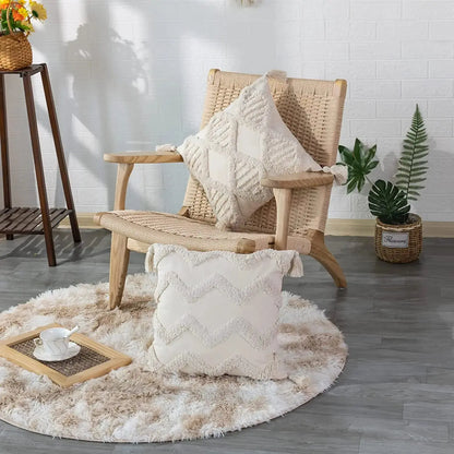 Wicker chair with textured pillows on a fluffy rug in a room