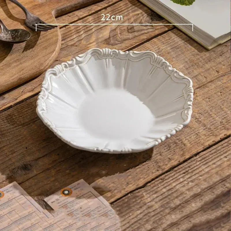 White decorative bowl on a wooden surface with measurement