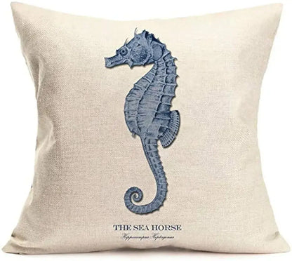 Decorative pillow with a blue seahorse design on a beige