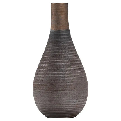 Textured brown vase on a white background
