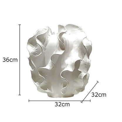 White decorative object with dimensions indicated on a white background