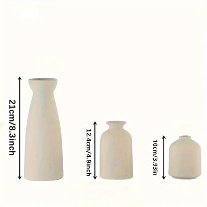 Three ceramic vases of different sizes with measurements