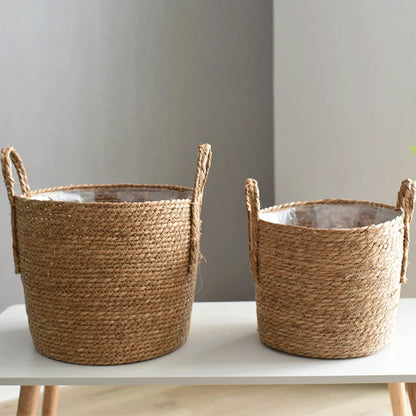 Two woven baskets on a white surface with a neutral background